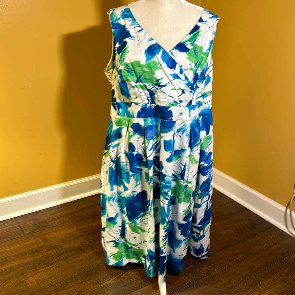Studio I sleeveless white dress with blue and green abstract pattern.